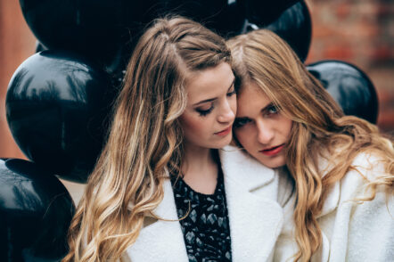 Girls with Black Balloons